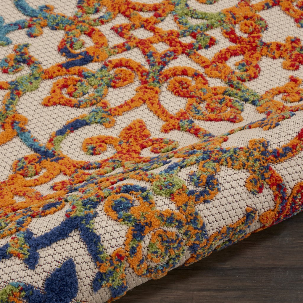 5' X 8' Ivory And Blue Floral Indoor Outdoor Area Rug