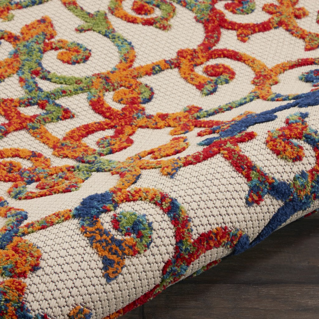 5' X 8' Ivory And Blue Floral Indoor Outdoor Area Rug