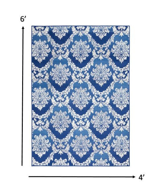 4' X 6' Blue Floral Dhurrie Area Rug
